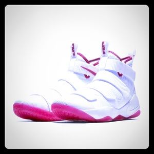 White and pink Lebron basketball shoes